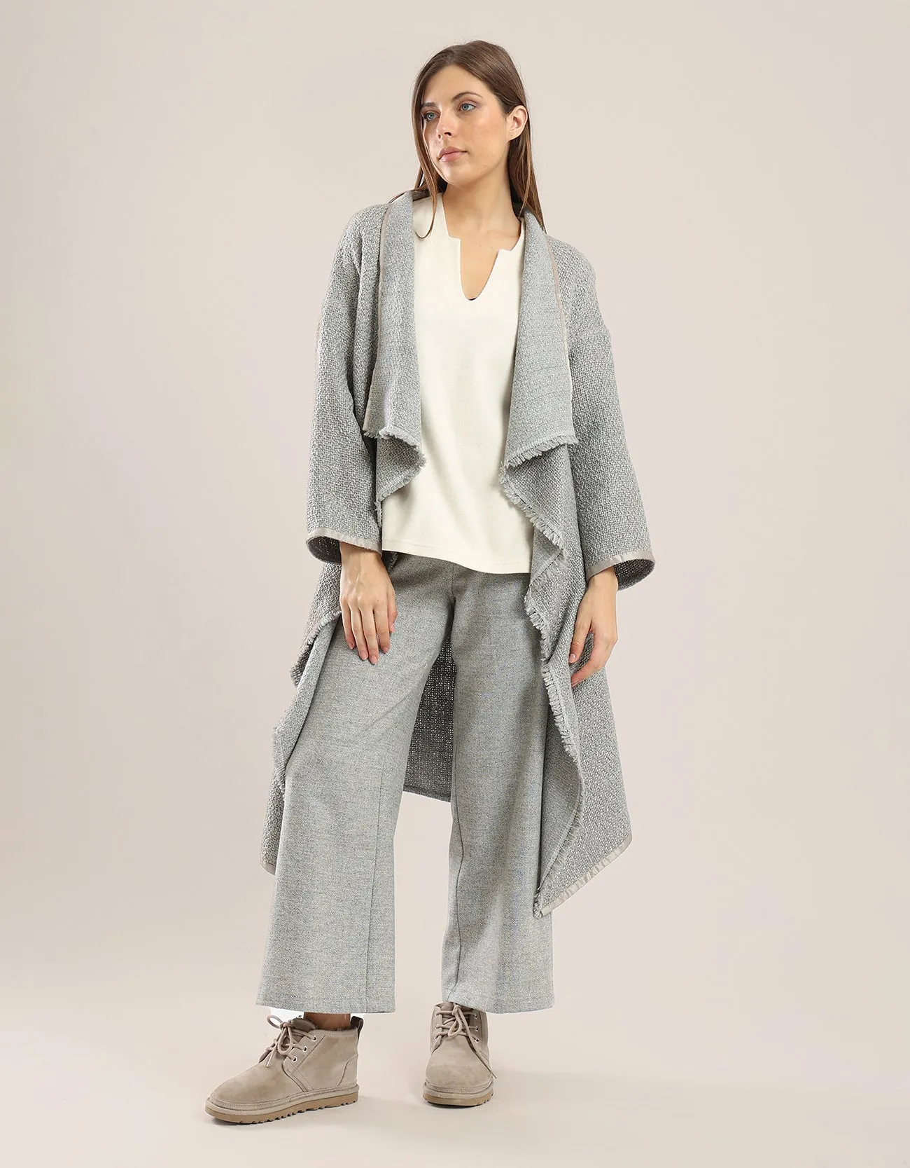 Coat with draped collar